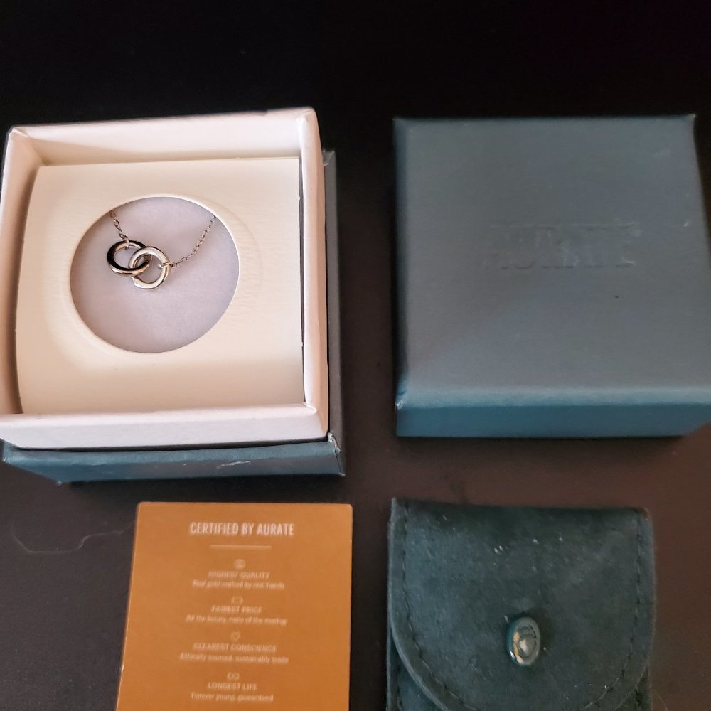 Beautiful never worn white gold connection necklace from Aurate
